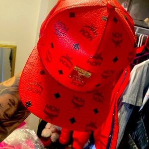 SOLD - MCM red leather hat adjustable with Gold plaque